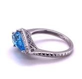 14 Karat White Gold Swiss Blue Topaz and Diamond Ring